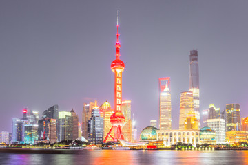 Obraz premium Beautiful Shanghai skyline at night,modern urban background