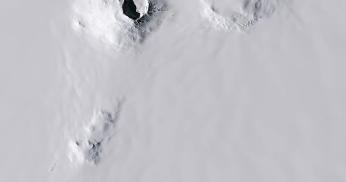 High-altitude overflight aerial of Mount Sidley and ice sheets of Antarctica's Pacific Coast. Clip loops and is reversible. Elements of this image furnished by USGS/NASA Landsat