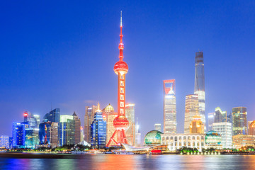 Obraz premium Beautiful Shanghai skyline at night,modern urban background