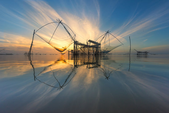 Square dip nets twilight time in southern Thailand Seascape

