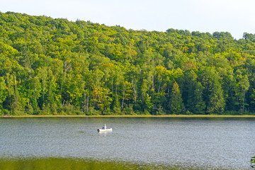 Canoer on a Quiet Lake