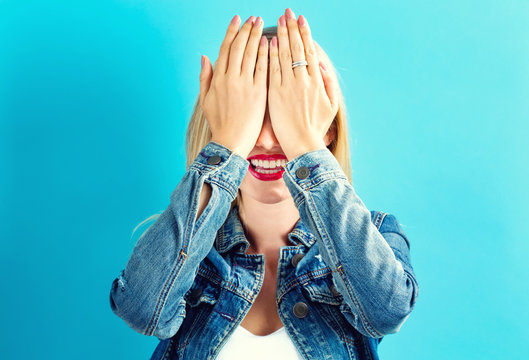 Woman Covering Her Eyes With Her Hands