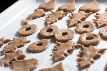 Christmas cookies dough on baking sheet