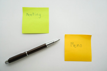 business concept of memo of meeting and pen