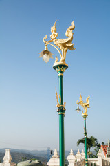 Fototapeta na wymiar Art lamp in the temple (sky background)