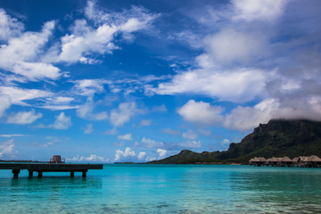 Fototapeta na wymiar Bench Overlooking the Bay at Bora Bora