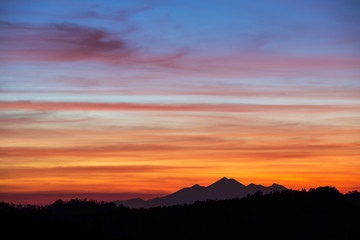 Beautiful sunset sky over the mountains in Bali, Indonesia