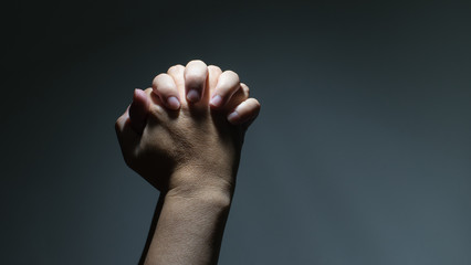 Praying Hands in black background