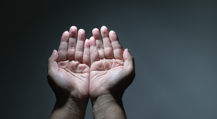 Praying Hands in black background