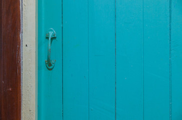 Fototapeta premium Nong Khai, Thailand, Blue wooden door in the room.