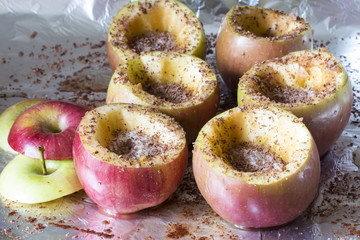 homemade sweet baked apples with chocolate in the oven close