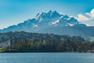 View of Lucerne lake with Swiss alps from a ferry, Switzerland - April, 2016