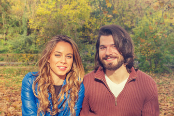 Fototapeta premium Cute couple hanging out in the park.