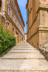 Fototapeta na wymiar Staircase between houses in an Italian town