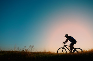 Male cyclist driving outdoors