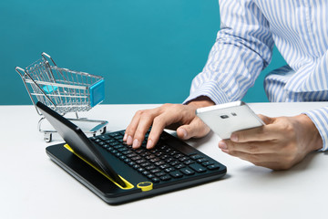 Using laptop to online shopping and pay by credit card. Business and sales concept