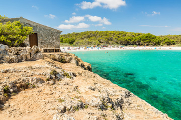 Cala S'Amarador with small fisherman's house. Beach is one of two beautiful beaches in Mondrago Natural Park on the south eastern coast of Mallorca. Mallorca island, Spain.