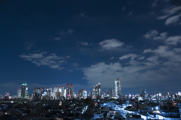 Fototapeta na wymiar 東京都市風景　夜景　新宿高層ビル群　全景　東京都庁　都庁特別ライトアップ