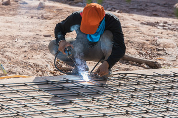 Welding steel structure in construction site