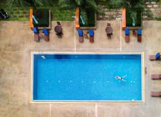 Top view of swimming pool ,Man swim in the pool