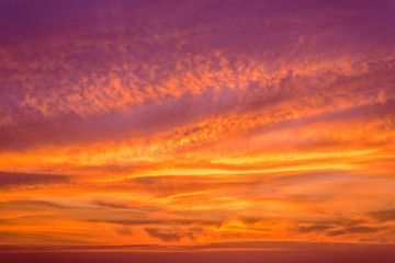 Red clouds with sunset sky in the evening like fire.