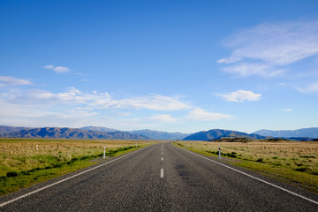 Fototapeta na wymiar Highway 8, the road between Lake Tekapo and Lake Pukaki in the South Island, during spring season of New Zealand.