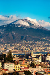 Aerial view of Naples with Vesuvius mount with snow on the backg