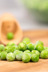 Frozen green peas with blurred background