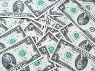 Dollar (USD) banknotes, currency of United States (USA). Many paper money background.