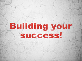 Business concept: Building your Success! on wall background