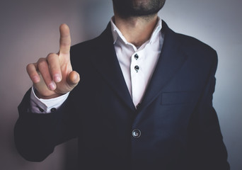 businessman pointing finger