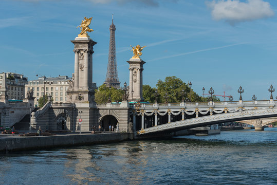 France. The bridge through the river in Paris