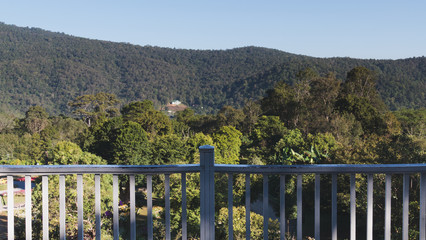 Fototapeta premium white wood terrace balcony on hill with mountain view