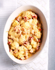 Cauliflower and ham cheese bake in a tin