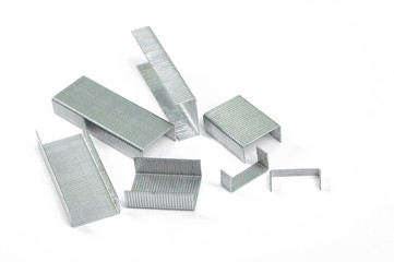 Staples, closeup on white background