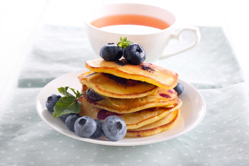 Blueberry pancakes in a stack