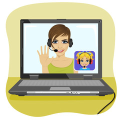 Young mom chatting with her daughter via internet. Video call and chat concept. Modern communication technology.