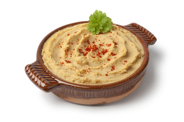 Bowl with hummus and chili pepper