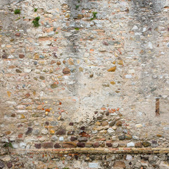 Grunge Ancient Stone Wall With Broken Stucco Background