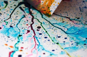 Blue, Green and Red ink sprayed in a sink