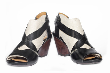 Black Womens shoes on white background.