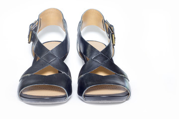 Black Womens shoes on white background.