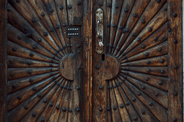 Carved wooden door with a pattern