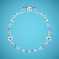 Floral wreath isolated on blue