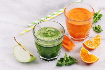 Fototapeta premium Fresh juice from seasonal fruits and vegetables.Healthy eating concept.Selective focus