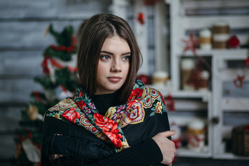 Fototapeta premium Beautiful young woman wearing scarf