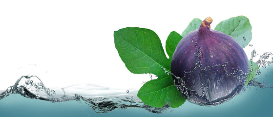 Juicy fruit figs on a background of splashing water.