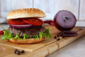 Meat burger with a spicy chilli pepper