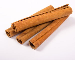 Cinnamon sticks isolated on white background.