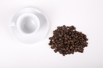 cup of coffe with beans on white background